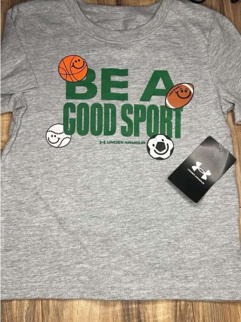 Under Armour Gray Tee with Green 'Be A Good Sport' Graphic